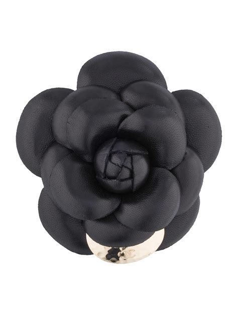 chanel camelia brooch.